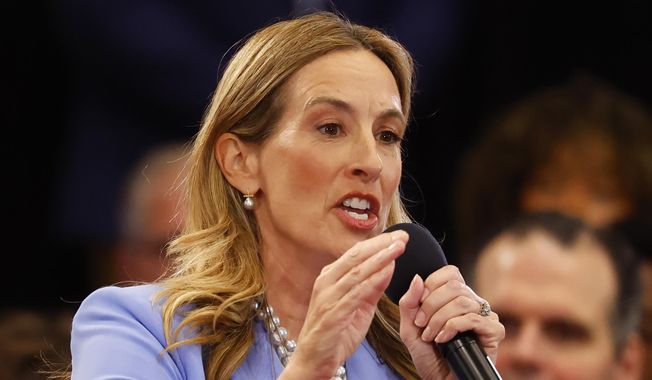 Democrat Mikie Sherrill responds to questions during the first general election gubernatorial debate with Republican opponent Jack Ciattarelli. Sunday, Sept. 21, 2025, in Lawrenceville, N.J. (AP Photo/Noah K. Murray)