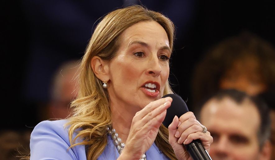Democrat Mikie Sherrill responds to questions during the first general election gubernatorial debate with Republican opponent Jack Ciattarelli. Sunday, Sept. 21, 2025, in Lawrenceville, N.J. (AP Photo/Noah K. Murray)
