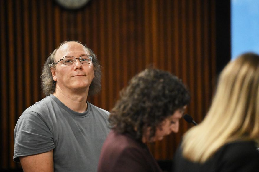 Lorenz Kraus, a 53-year-old man who was arrested for murder after telling a television news anchor that he killed his parents, is arraigned before Judge Joshua Farrell on Friday, Sept. 26, 2025, at Albany City Court in Albany, N.Y. (Will Waldron/The Albany Times Union via AP)