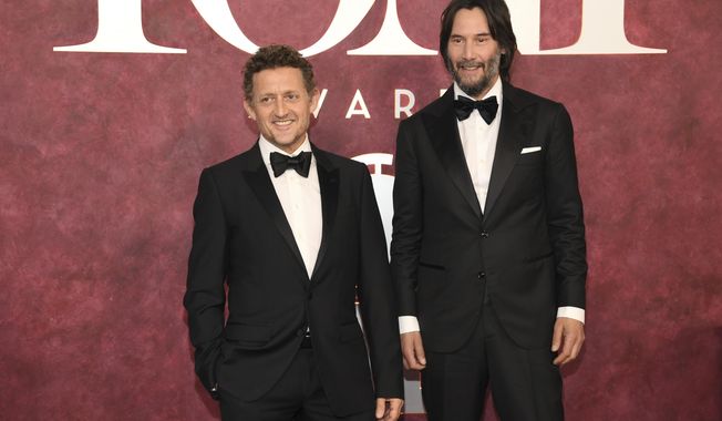FILE - Alex Winter, left, and Keanu Reeves arrive at the 78th Tony Awards in New York on June 8, 2025. (Photo by Evan Agostini/Invision/AP, File)