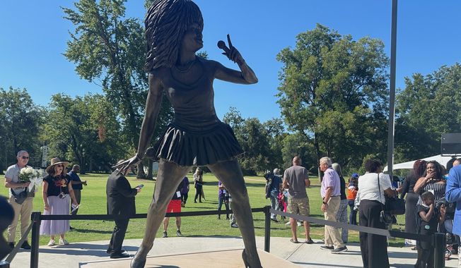 A newly-unveiled statue of singer Tina Turner stands at a park on Saturday, Sept. 27, 2025, in Brownsville, Tenn. (AP Photo/Adrian Sainz).