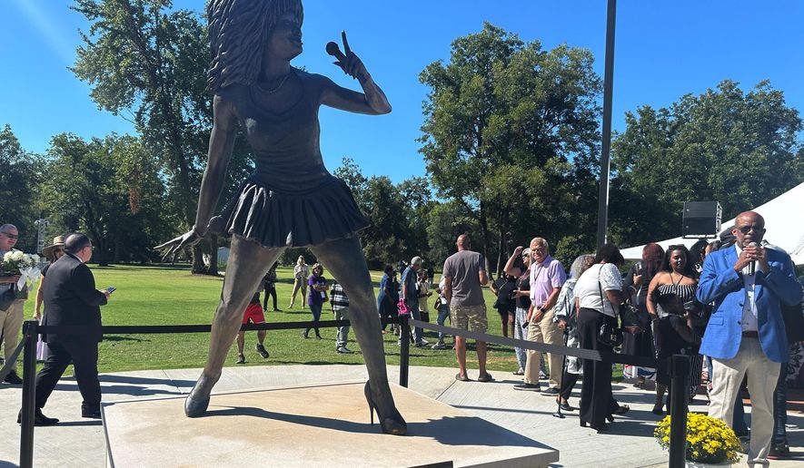 A newly-unveiled statue of singer Tina Turner stands at a park on Saturday, Sept. 27, 2025, in Brownsville, Tenn. (AP Photo/Adrian Sainz).