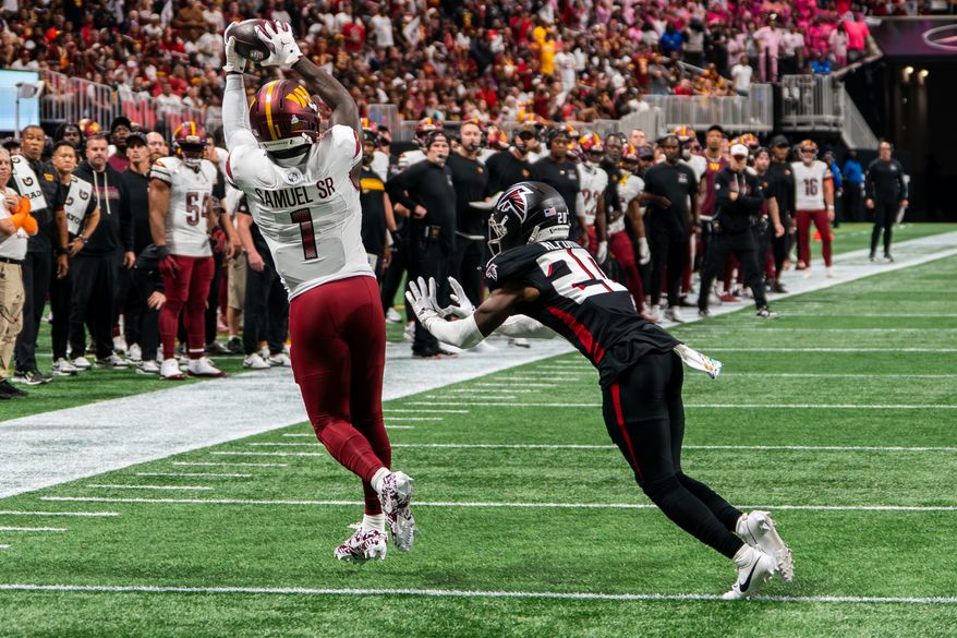 Washington Commanders Wide Receiver Deebo Samuel (1) catches pass thrown by Washington Commanders Quarterback Marcus Mariota (8) at Mercedes-Benz Stadium in Atlanta, Georgia. The Atlanta Falcons defeated the Washington Commanders 34-27 during NFL Week 3 on September 28, 2025. (Photo by Jordan Sabillo for Washington Times)