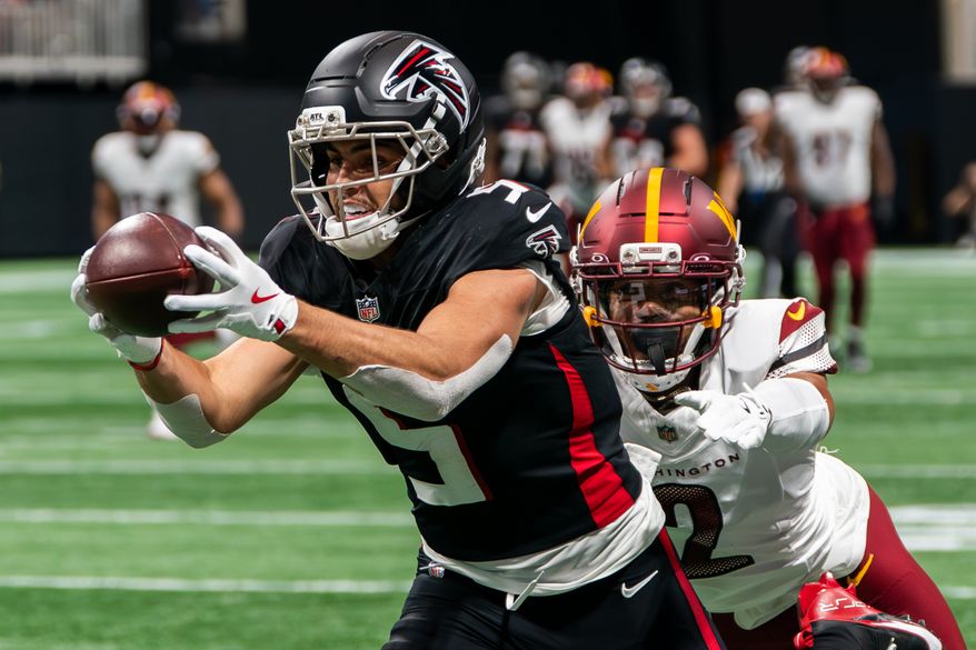 Atlanta Falcons Wide Receiver Drake London (5) catches pass from Atlanta Falcons Quarterback Michaell Penix (9) at Mercedes-Benz Stadium in Atlanta, Georgia. The Atlanta Falcons defeated the Washington Commanders 34-27 during NFL Week 3 on September 28, 2025. (Photo by Jordan Sabillo for Washington Times)