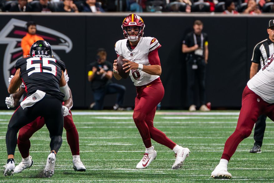 Washington Commanders Quarterback Marcus Mariota (8) drops back for a pass at Mercedes-Benz Stadium in Atlanta, Georgia. The Atlanta Falcons defeated the Washington Commanders 34-27 during NFL Week 3 on September 28, 2025. (Photo by Jordan Sabillo for Washington Times)