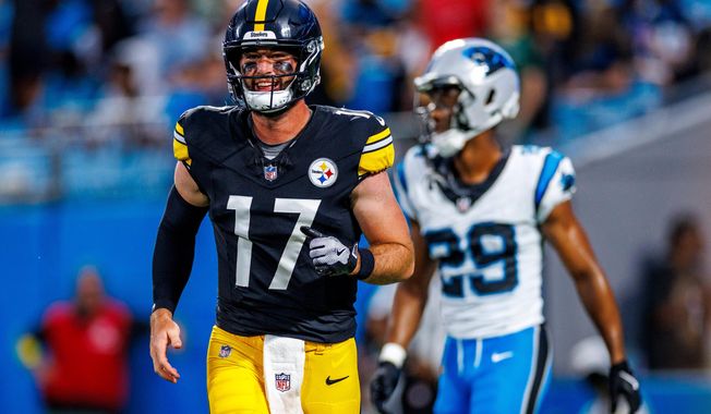 FILE - Pittsburgh Steelers quarterback Skylar Thompson (17) celebrates a touchdown pass during an NFL football game against the Carolina Panthers, Thursday, Aug. 21, 2025, in Charlotte, N.C. (AP Photo/Rusty Jones, File)