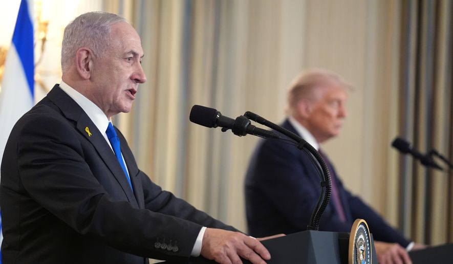 Israeli Prime Minister Benjamin Netanyahu speaks during a news conference with President Donald Trump in the State Dining Room of the White House, Monday, Sept. 29, 2025, in Washington. (AP Photo/Evan Vucci)