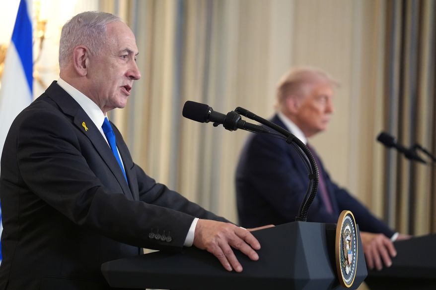 Israeli Prime Minister Benjamin Netanyahu speaks during a news conference with President Donald Trump in the State Dining Room of the White House, Monday, Sept. 29, 2025, in Washington. (AP Photo/Evan Vucci)