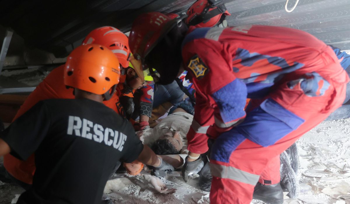 NextImg:At least 65 students presumed buried under rubble after school collapses in Indonesia