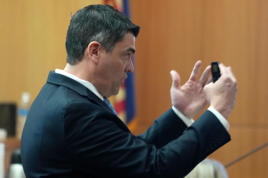 Prosecutor Josh Maxwell speaks to the jury during the sentencing hearing of Cleophus Cooksey Jr. after being convicted of killing eight people during his trial Monday, Sept. 29, 2025, in Phoenix. (AP Photo/Ross D. Franklin)