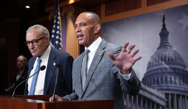 Senate Minority Leader Chuck Schumer, D-N.Y., and House Minority Leader Hakeem Jeffries, D-N.Y., right, talk with reporters following their meeting with President Donald Trump and Republican leaders on the government funding crisis, at the Capitol in Washington, Monday, Sept. 29, 2025. (AP Photo/J. Scott Applewhite)