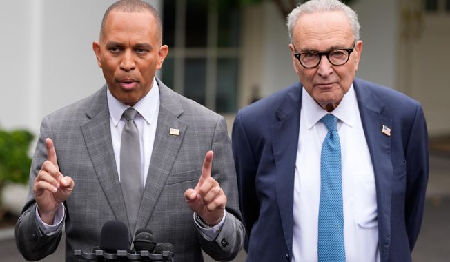 House Minority Leader Hakeem Jeffries, D-N.Y., and Senate Minority Leader Chuck Schumer of N.Y., talk to reporters outside the West Wing of the White House, Monday, Sept. 29, 2025, in Washington. (AP Photo/Alex Brandon)