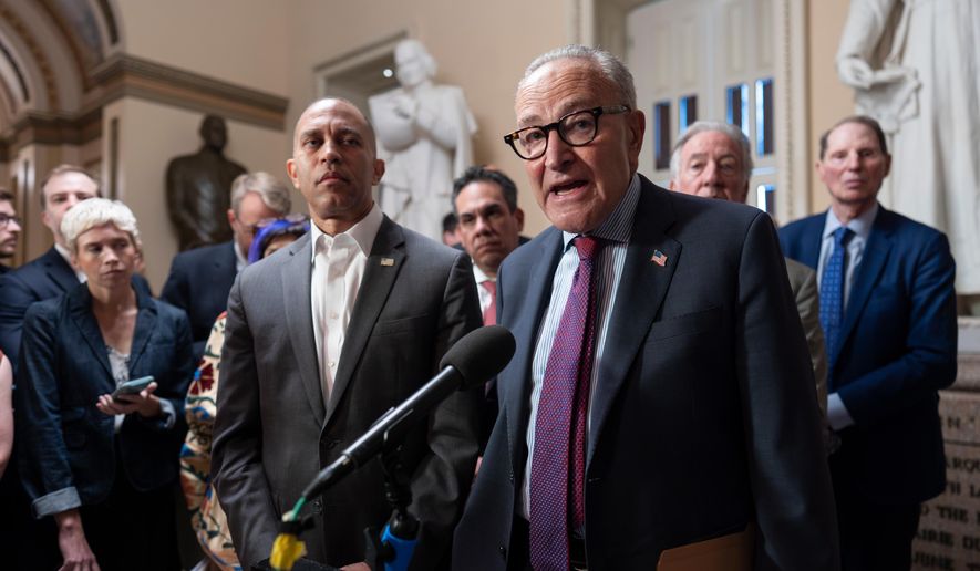 House Democratic Leader Hakeem Jeffries, left, and Senate Democratic Leader Chuck Schumer, both of New York, tell reporters that they are united as the Sept. 30 funding deadline approaches, at the Capitol in Washington, Sept. 11, 2025. (AP Photo/J. Scott Applewhite, File)