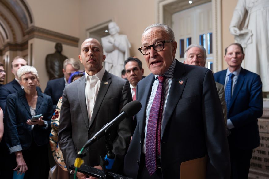 House Democratic Leader Hakeem Jeffries, left, and Senate Democratic Leader Chuck Schumer, both of New York, tell reporters that they are united as the Sept. 30 funding deadline approaches, at the Capitol in Washington, Sept. 11, 2025. (AP Photo/J. Scott Applewhite, File)