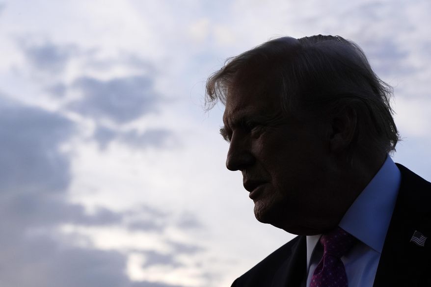President Trump speaks with reporters before boarding Air Force One at Morristown Airport, Sept. 14, 2025, in Morristown, N.J. (AP Photo/Alex Brandon, File)