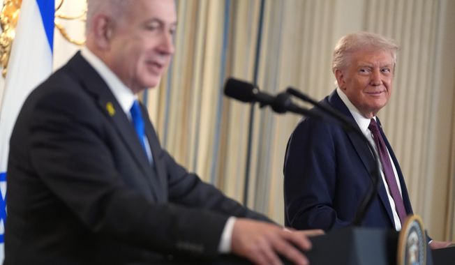 President Donald Trump listens during a news conference with Israeli Prime Minister Benjamin Netanyahu in the State Dining Room of the White House in Washington on Monday, Sept. 29, 2025. (AP Photo/Evan Vucci) **FILE**
