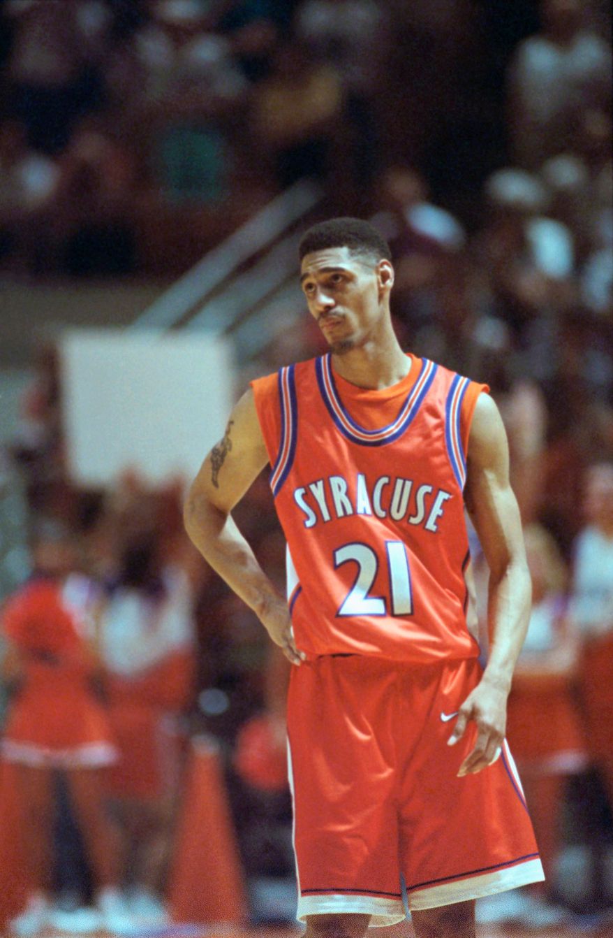 Syracuse's Lawrence Moten reacts after being called for a technical foul after calling a timeout when his team had none left in a game against Arkansas in the second round of the NCAA Midwest Regionals in Austin, Texas, March 19, 1995. (AP Photo/Cliff Schiappa, File). **FILE**