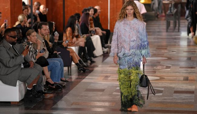 A model wears a creation as part of the Louis Vuitton Spring/Summer 2026 collection presented in Paris, Tuesday, Sept. 30, 2025. (AP Photo/Aurelien Morissard)
