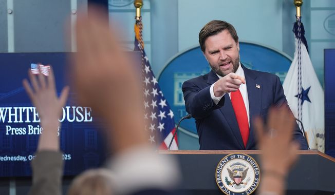 Vice President JD Vance, gestures while speaking with reporters in the James Brady Press Briefing Room at the White House, Wednesday, Oct. 1, 2025, in Washington. (AP Photo/Evan Vucci)
