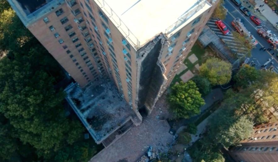 This image provided by the Fire Department of New York, FDNY shows part of a high-rise apartment building that collapsed, leaving a corner of the building in a pile of rubble, in New York, Wednesday, Oct. 1, 2025. (FDNY via AP)