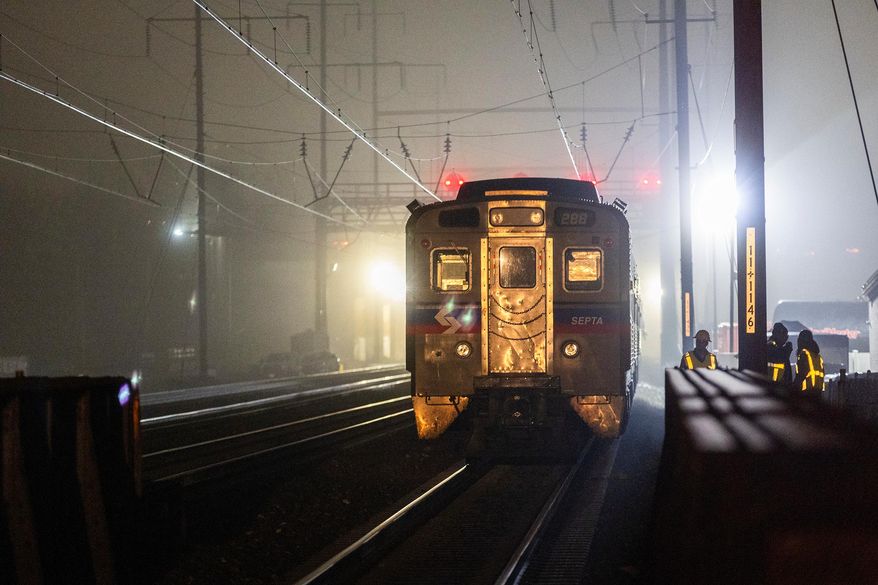 FILE - A SEPTA Regional Rail train sits after the train caught fire Feb. 6, 2025 in Ridley Park, Pa. (Charles Fox/The Philadelphia Inquirer via AP, File)