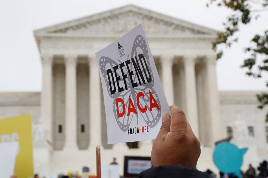 In this file photo, people rally outside the Supreme Court in support of the Deferred Action for Childhood Arrivals program (DACA), in Washington, Nov. 12, 2019. (AP Photo/Jacquelyn Martin, File)
