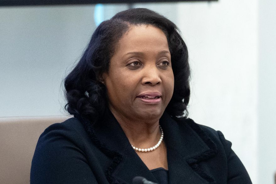 Federal Reserve Board of Governors member Lisa Cook listens during an open meeting of the Board of Governors in Washington on June 25, 2025. (AP Photo/Mark Schiefelbein) **FILE**