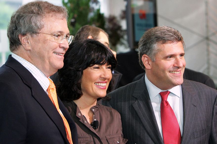 Retired CNN News Group Chairman and CEO Tom Johnson, left, CNN Chief International Correspondent Christiane Amanpour, center, and CEO and Chairman of Turner Broadcasting System Phil Kent pose together at the CNN 25 World Report Conference in Atlanta on June 1, 2005. (AP Photo/Ric Feld, File)