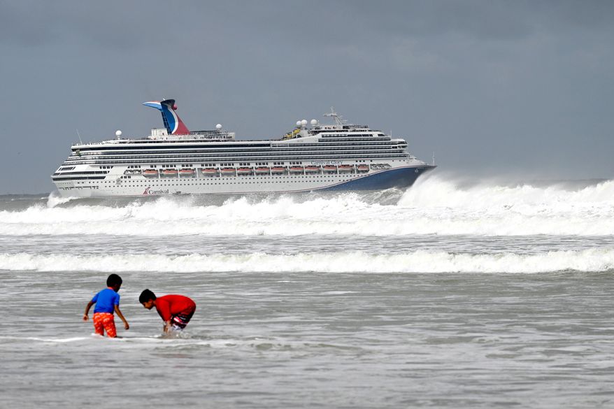 The Carnival Glory cruise ship sets sail as Tropical Storm Imelda passes offshore, Monday, Sept. 29, 2025, in Port Canaveral, Fla. (AP Photo/Phelan M. Ebenhack)