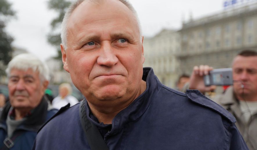 FILE - Veteran Belarusian opposition activist Mikalai Statkevich is seen at a protest in Minsk, Belarus, on Sept. 8, 2017. (AP Photo, File)