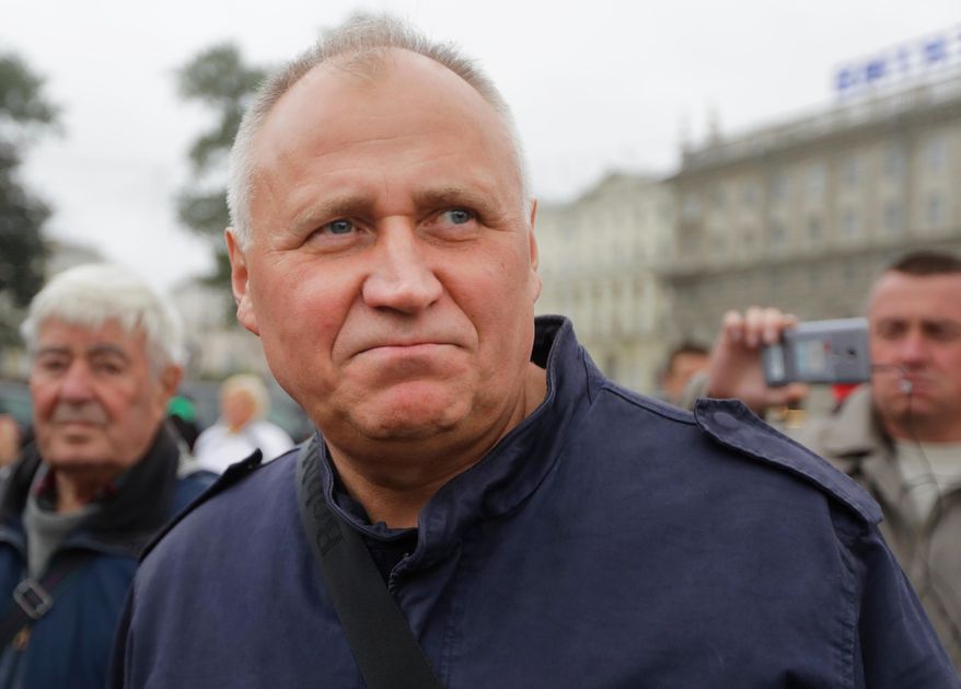 FILE - Veteran Belarusian opposition activist Mikalai Statkevich is seen at a protest in Minsk, Belarus, on Sept. 8, 2017. (AP Photo, File)