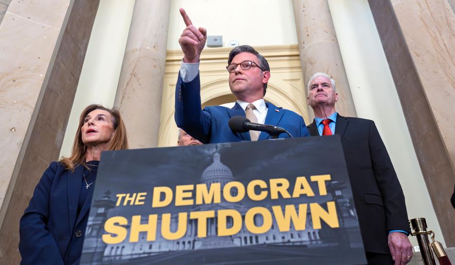 Speaker of the House Mike Johnson, R-La., and GOP leaders, from left, Rep. Lisa McClain, R-Mich., and Majority Whip Tom Emmer, R-Minn., blame the government shutdown on Democrats during a news conference at the Capitol in Washington, Thursday, Oct. 2, 2025. (AP Photo/J. Scott Applewhite)