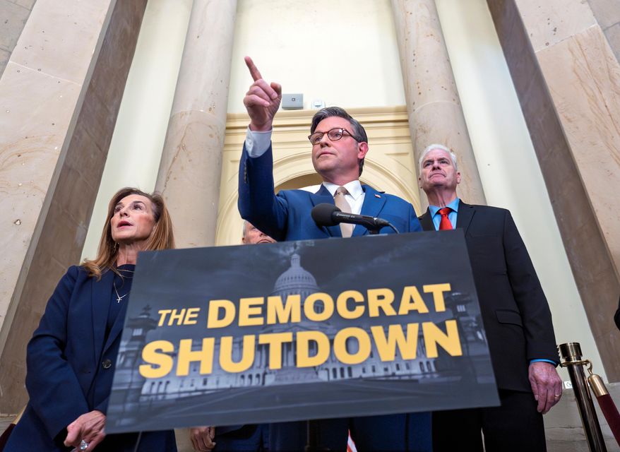 Speaker of the House Mike Johnson, R-La., and GOP leaders, from left, Rep. Lisa McClain, R-Mich., and Majority Whip Tom Emmer, R-Minn., blame the government shutdown on Democrats during a news conference at the Capitol in Washington, Thursday, Oct. 2, 2025. (AP Photo/J. Scott Applewhite)