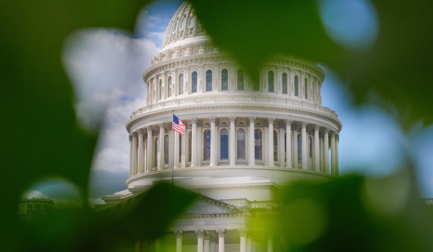 The U.S. Capitol is seen, Thursday, Oct. 2, 2025, in Washington. (AP Photo/Mariam Zuhaib)