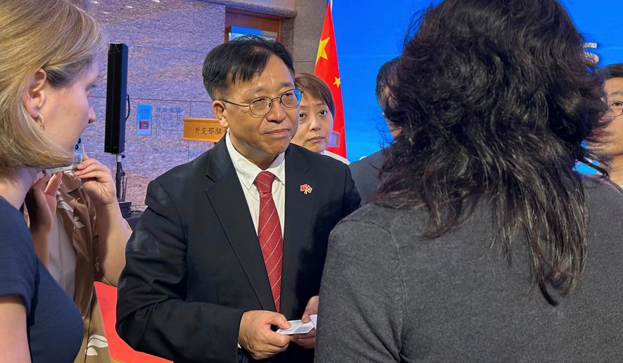 FILE - Cui Jianchun, Commissioner of China's Foreign Ministry in Hong Kong, meets with the press, in Hong Kong, on July 30, 2024 (AP Photo/Kanis Leung, File)