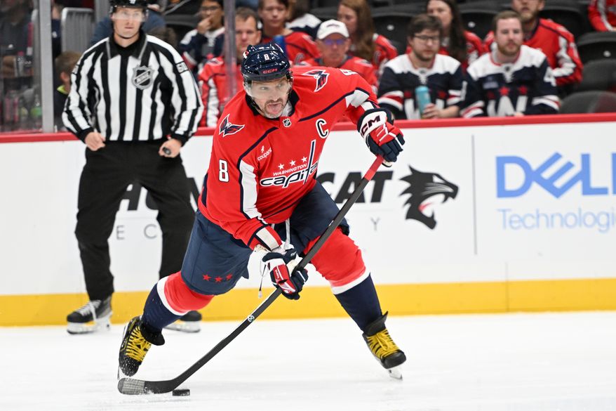Washington Capitals left wing Alex Ovechkin (8) taking a shot during the second period of a preseason NHL game against the Boston Bruins at Capital One Arena in Washington D.C., October 2, 2025. (Photo for the Washington Times)