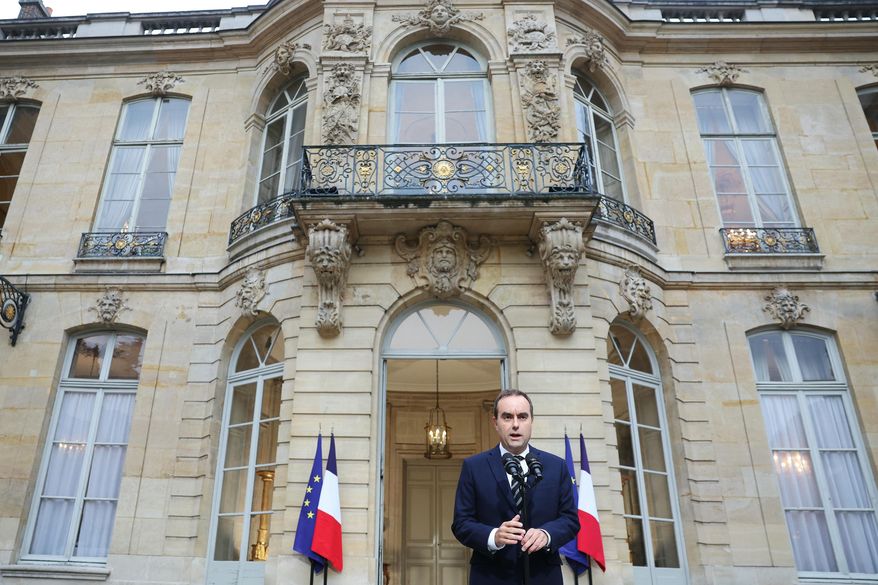 French Prime Minister Sebastien Lecornu delivers a statement at the Hotel Matignon in Paris, Friday Oct. 3, 2025, before a round of consultations with political parties ahead of the announcement of the new government. (Alain Jocard, Pool Photo via AP)