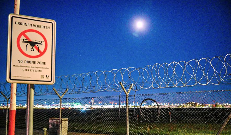 A sign prohibiting drones is seen at the Munich Airport on Friday, Oct. 3, 2025. (Enrique Kaczor/dpa via AP)