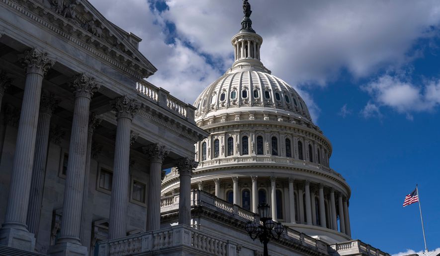 The U.S. Capitol is seen on the second day of the government shutdown, in Washington, Thursday, Oct. 2, 2025. (AP Photo/J. Scott Applewhite)