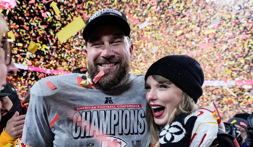 Travis Kelce, left, and Taylor Swift pose after the AFC Championship NFL football game against the Buffalo Bills, Jan. 26, 2025, in Kansas City, Mo. (AP Photo/Ashley Landis, File)