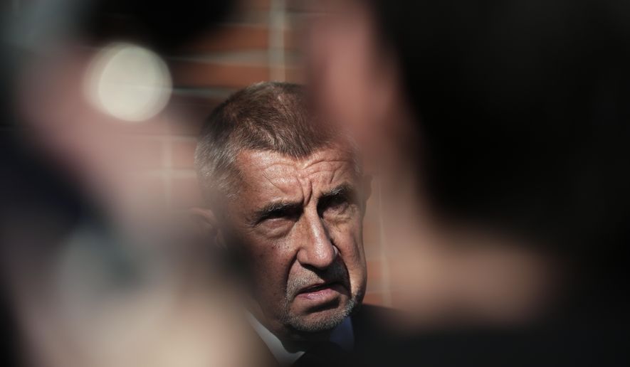 Chairman of opposition "ANO" (YES) movement Andrej Babis speaks to the media after casting his ballot for a general election at a polling station in Ostrava, Czech Republic, Friday, Oct. 3, 2025. (AP Photo/Petr David Josek)