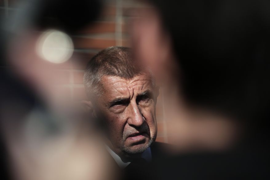 Chairman of opposition "ANO" (YES) movement Andrej Babis speaks to the media after casting his ballot for a general election at a polling station in Ostrava, Czech Republic, Friday, Oct. 3, 2025. (AP Photo/Petr David Josek)