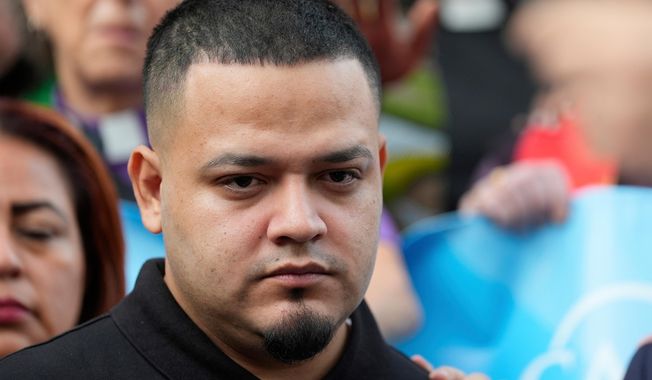 FILE - Kilmar Abrego Garcia attends a protest rally at the Immigration and Customs Enforcement field office in Baltimore, Monday, Aug. 25, 2025, to support Abrego Garcia. (AP Photo/Stephanie Scarbrough, File)
