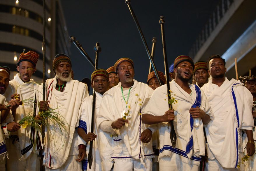 People attend the annual thanksgiving celebrations in Addis Ababa, Ethiopia, Saturday, Oct 4, 2025. (AP Photo/Amanuel Birhane)