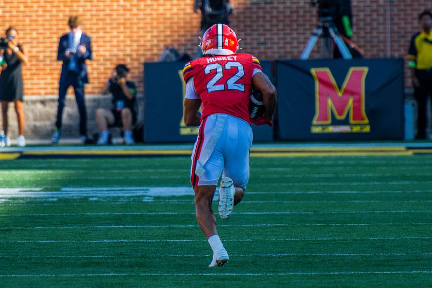 Maryland defensive back Jalen Huskey intercepts a pass from Washington quarterback Demond Williams Jr. in a game between the Terrapins and Huskies on Saturday, Oct. 4, 2025, at SECU Stadium in College Park, Maryland. (Neil Dalal/All-Pro Reels)