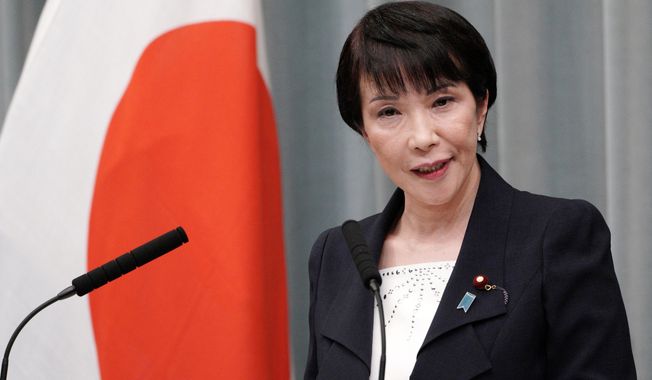 Internal Affairs and Communications Minister Sanae Takaichi speaks during a press conference at the prime minister's official residence in Tokyo, on Sept. 11, 2019. (AP Photo/Eugene Hoshiko, File)