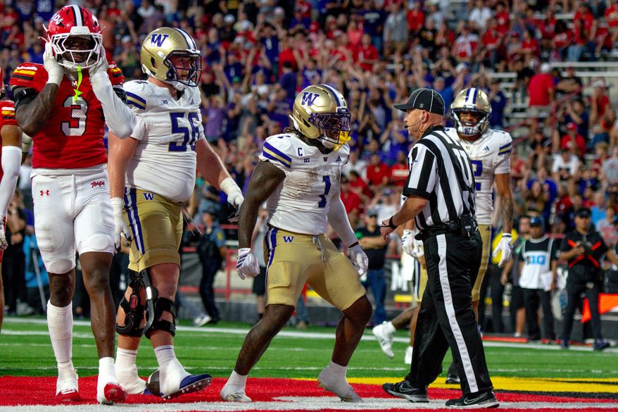Washington running back Jonah Coleman scores a touchdown in the fourth quarter of a game between the Huskies and Maryland Terrapins on Saturday, Oct. 4, 2025, at SECU Stadium in College Park, Maryland. (Neil Dalal/All-Pro Reels)