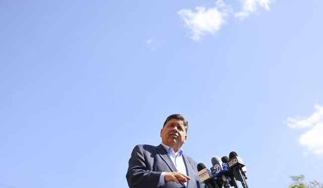 Gov. J.B. Pritzker speaks with reporters after visiting Prairie Oak Elementary School in Berwyn, Ill., Thursday, Sept. 4, 2025. (Anthony Vazquez/Chicago Sun-Times via AP, Pool)