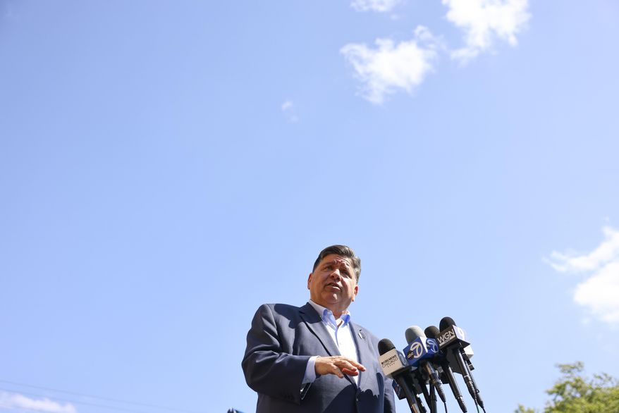 Gov. J.B. Pritzker speaks with reporters after visiting Prairie Oak Elementary School in Berwyn, Ill., Thursday, Sept. 4, 2025. (Anthony Vazquez/Chicago Sun-Times via AP, Pool)