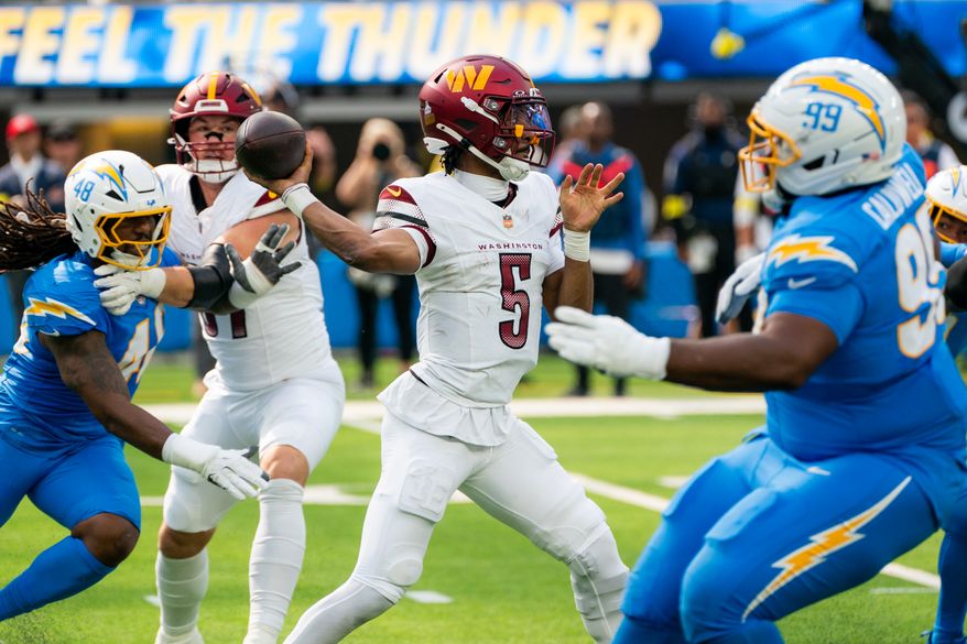 Washington Commanders Quarterback Jayden Daniels (5) throws pass in the pocket at SoFi Stadium in Inglewood California. The Washington Commanders defeated the Los Angeles Chargers 27-10 during NFL Week 5 on October 5th, 2025. (Photo by Jordan Sabillo for Washington Times)